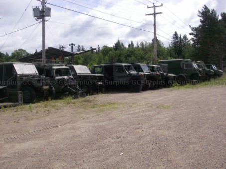 Picture of Lot of Vehicles and Trailers -