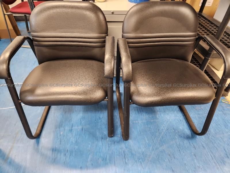 Picture of Two Black Faux Leather Chairs