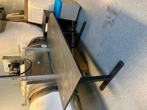 Photo de Table ajustable