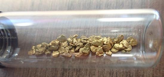 Picture of Cylinder of Small gold pieces
